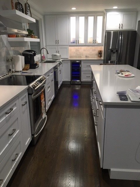 Our customer wanted an open and brighter kitchen. So we opened up  their tiny dark kitchen and gave them an open  concept feel through out the living and dining room.